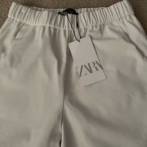 Zara, polyester Cream Colored Pants. Size XS. New With Tags. Fits more like a S.